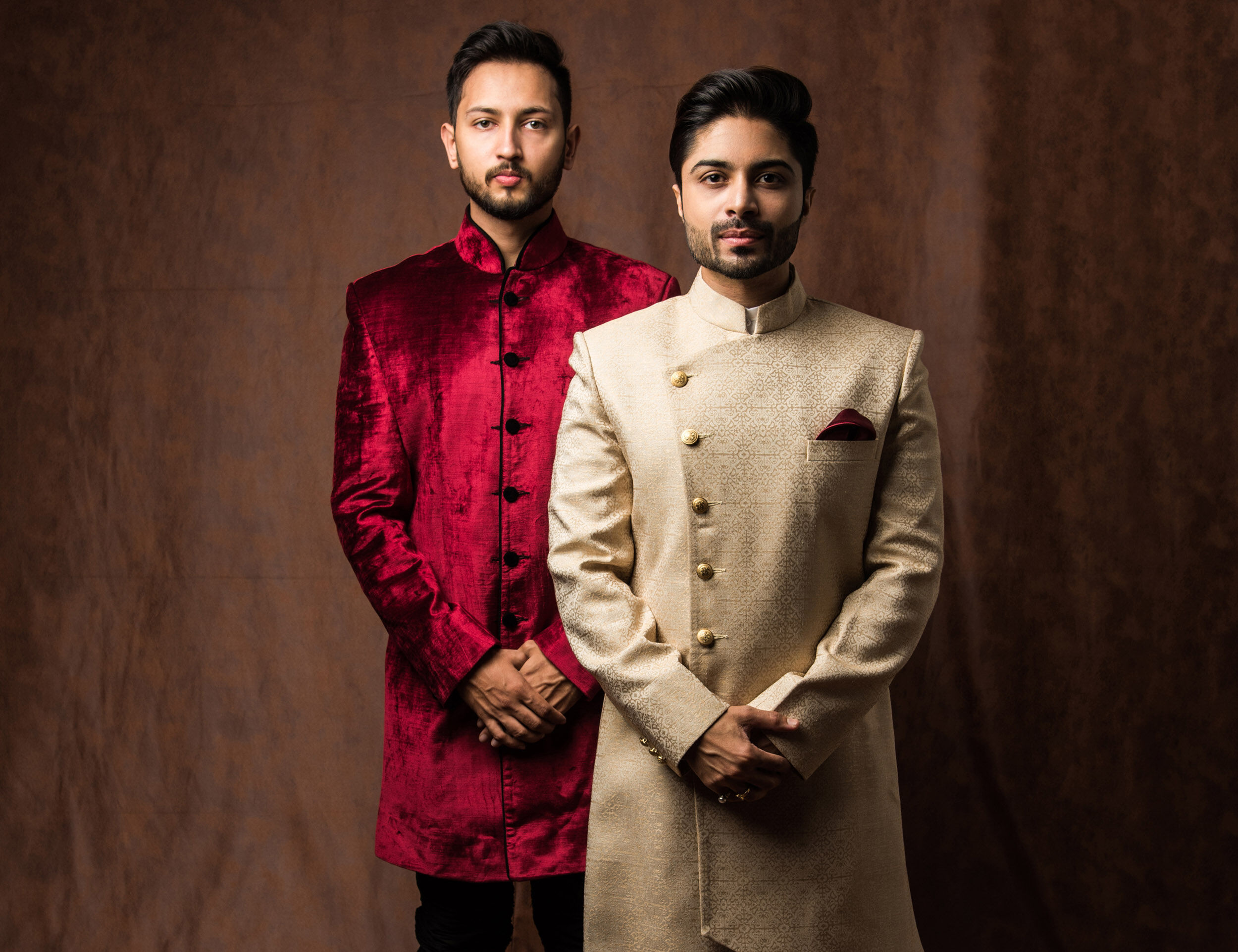 Boys dressed in traditional outfits for a wedding celebration